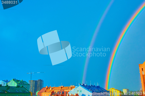 Image of Double rainbow over the city