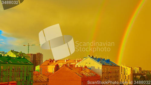 Image of Double rainbow over the city