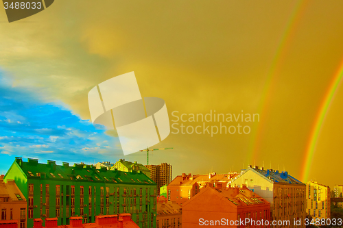 Image of Double rainbow over the city