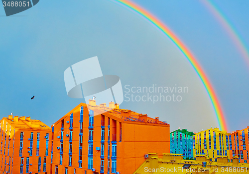 Image of Double rainbow over the city