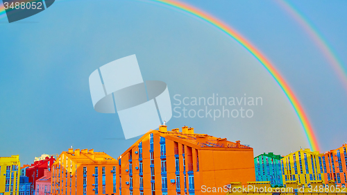 Image of Double rainbow over the city