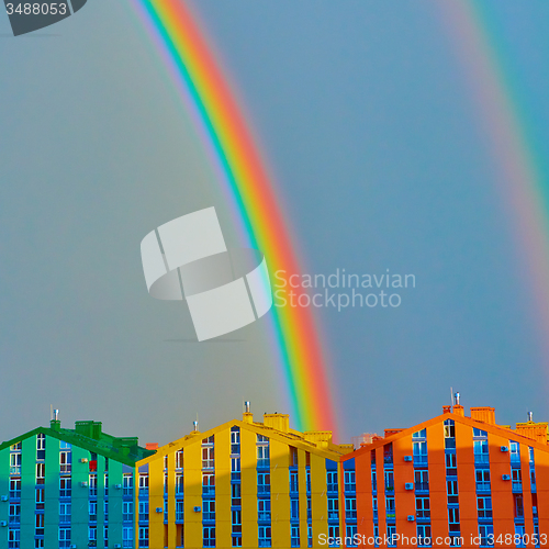 Image of Double rainbow over the city