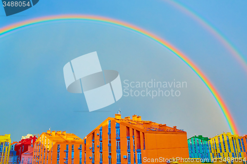 Image of Double rainbow over the city