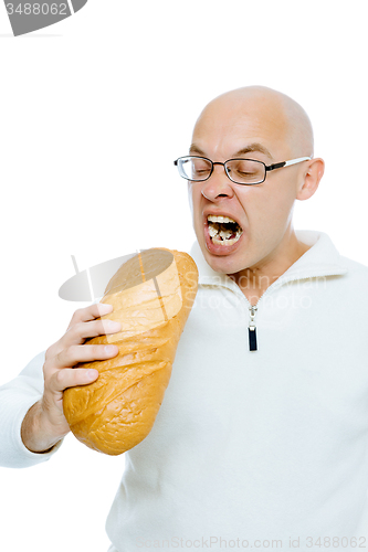Image of man biting a loaf. Isolated on white