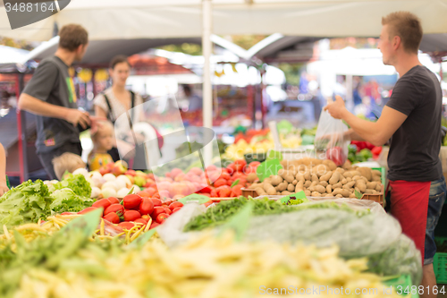 Image of Farmers\' food market stall with variety of organic vegetable.