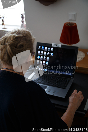 Image of Older person with computer