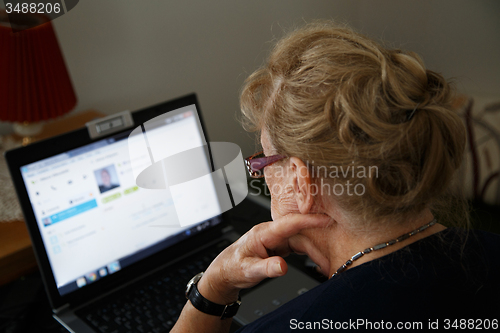 Image of senior on computer