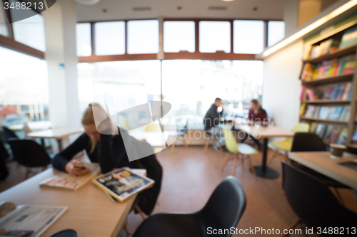 Image of reading in library