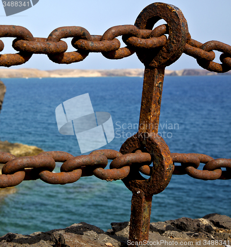 Image of chain  water  boat yacht coastline and summer in lanzarote spain