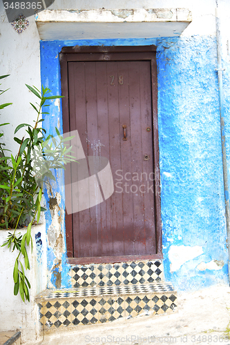 Image of historical blue  in  antique building    wood and metal rusty