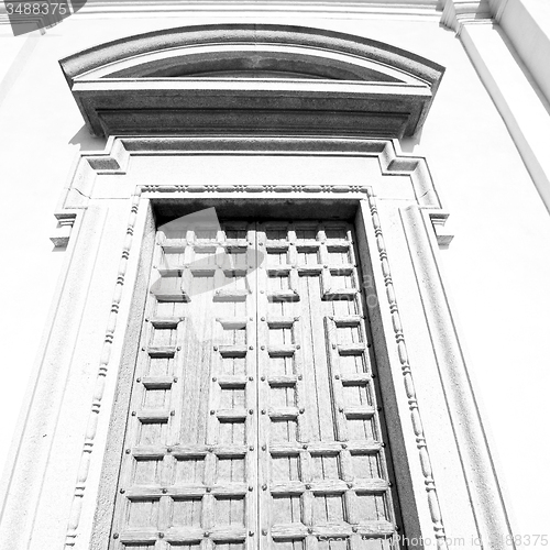 Image of door    in italy old ancian wood and traditional  texture nail