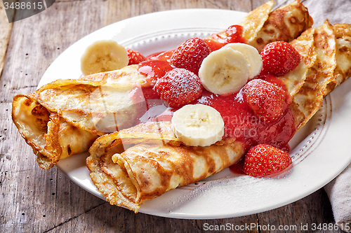 Image of crepes with strawberries and banana