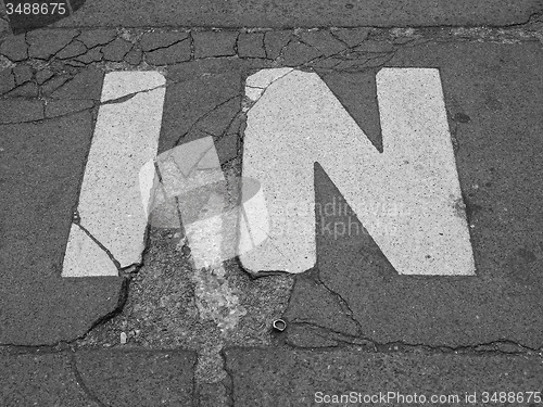 Image of Black and white In sign