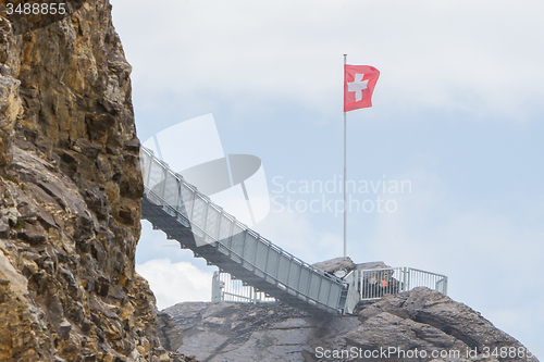 Image of LES DIABLERETS, SWIZTERLAND - JULY 22: People walk at the Glacie