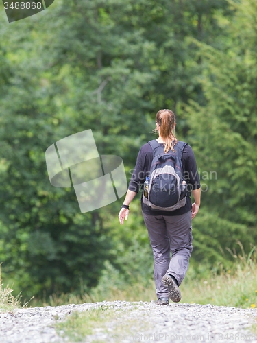 Image of Hiker, young woman with backpack