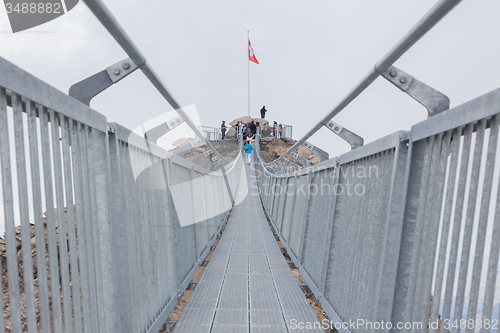 Image of LES DIABLERETS, SWIZTERLAND - JULY 22: People walk at the Glacie