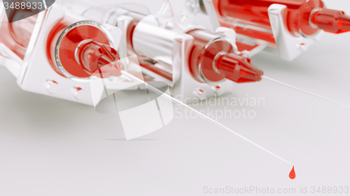 Image of syringe production line or conveyor with artistic shallow DOF