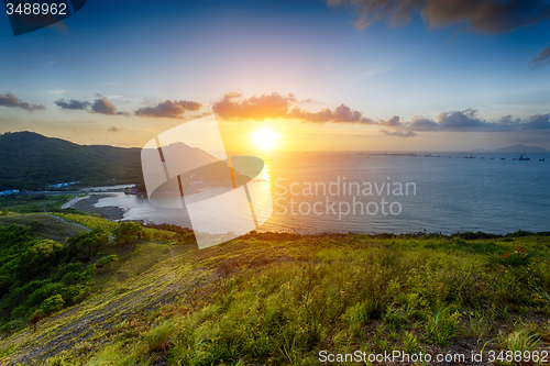 Image of Village with beautiful sunset over hong kong coastline