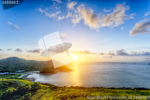 Image of Village with beautiful sunset over hong kong coastline