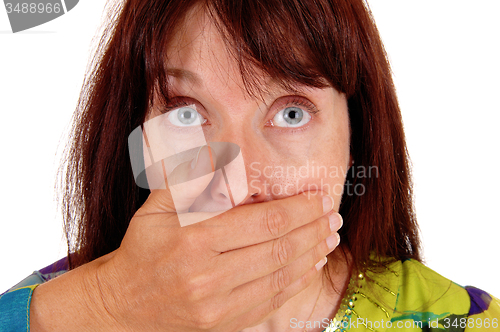 Image of Closeup of a very scared woman.