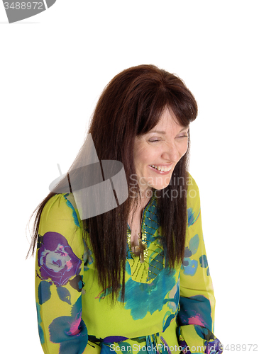Image of Middle age woman laughing.