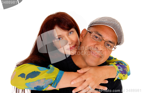 Image of Wife hugging her husband.