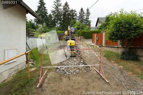 Image of excavator on trench - constructing canalization