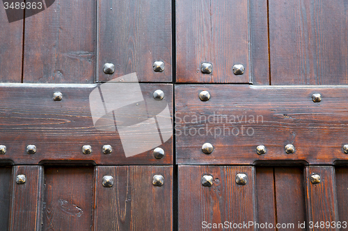 Image of vanzaghello abstract  rusty brass brown knocker in a   italy  va