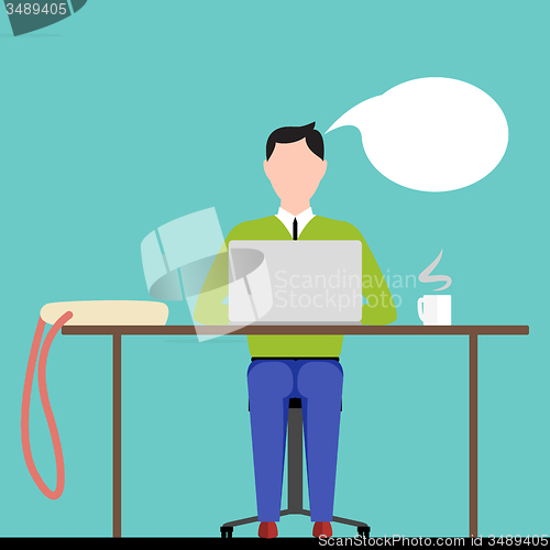 Image of Man Sitting Behind Laptop