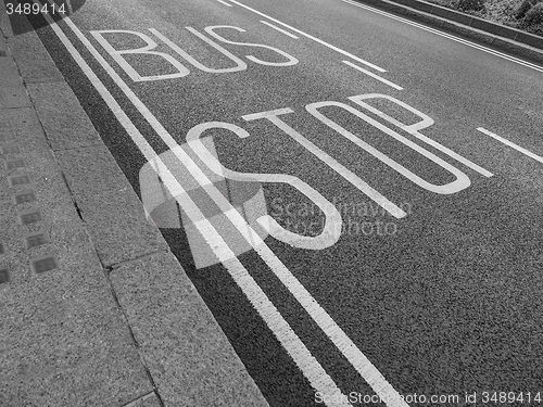 Image of Black and white Bus stop sign
