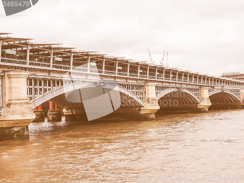 Image of Retro looking Blackfriars bridge in London