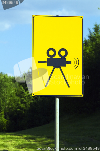 Image of road sign, warning about fixing speed