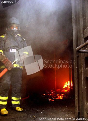 Image of fireman at work