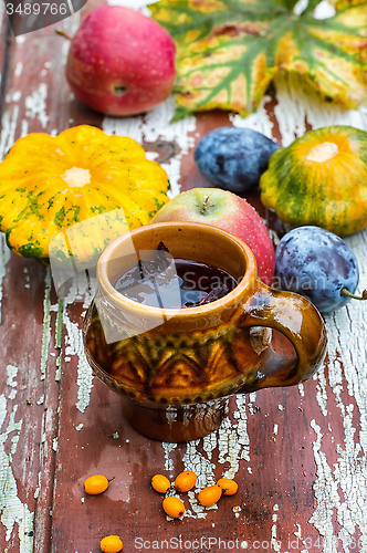 Image of Cup of tea in the autumn style