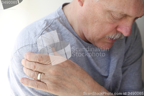 Image of Shoulder pain in a senior man