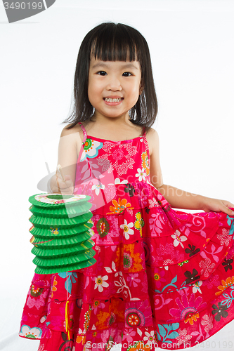 Image of Chinese little girl holding latern