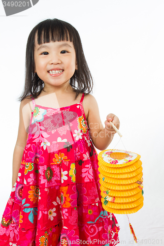 Image of Chinese little girl holding latern