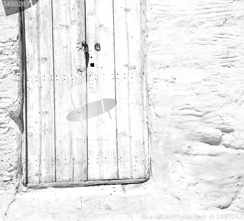 Image of blue door in antique village santorini greece europe and white w