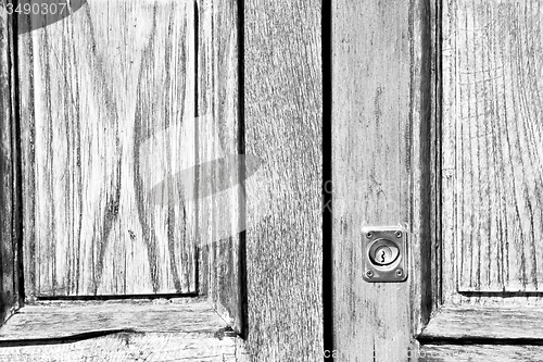 Image of  traditional   door    in italy   ancian wood and traditional  t