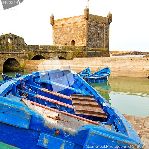 Image of   boat and sea in africa morocco old castle brown brick  sky
