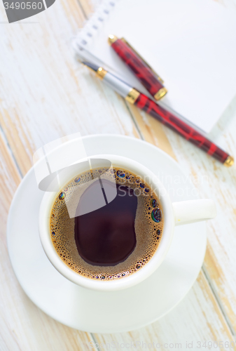Image of coffee and note