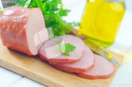 Image of Ham on wooden board