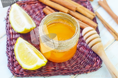 Image of honey,cinnamon,and lemon