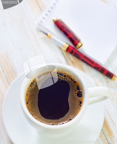 Image of coffee and note