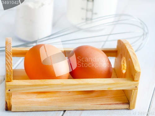 Image of ingredients for dough, eggs, flour and milk