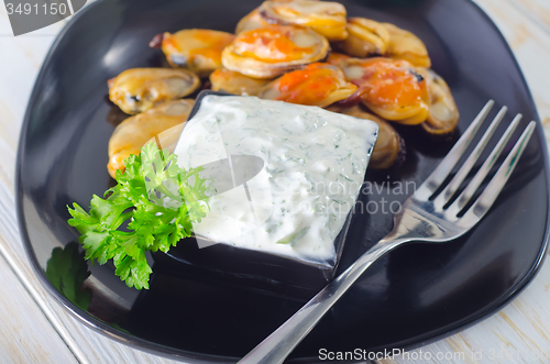 Image of mussels with sauce