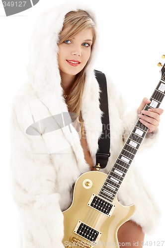 Image of golden guitar girl in fur