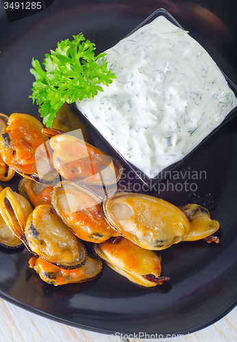 Image of mussels with sauce