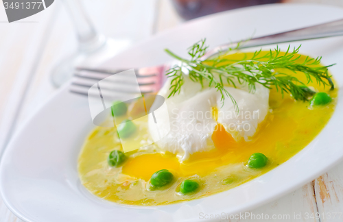 Image of Fresh soup from green peas and egg-poached