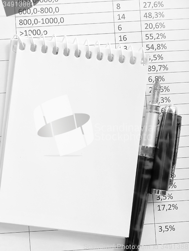 Image of pen and paper